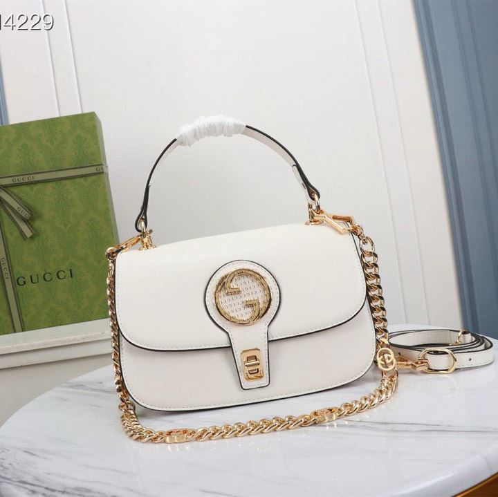 G*u*i top handle bags